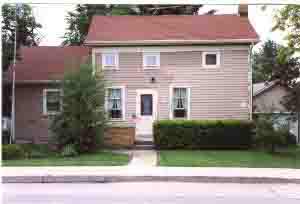 picture of early log home, W157N11681 - 1999